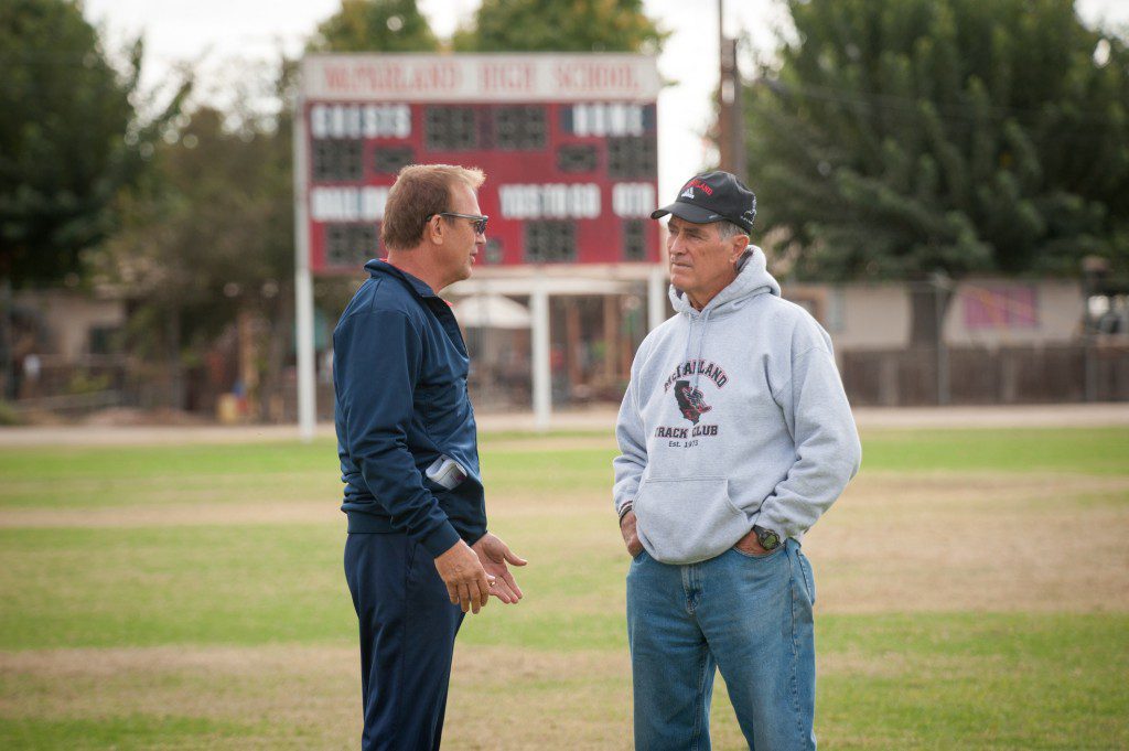 McFARLAND, USA..L to R: Kevin Costner (Coach Jim White) and real-life Coach Jim White on set of McFarland, USA.  ..Ph: Ron Phillips..©Disney 2015